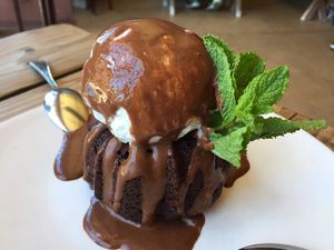 decadent chocolate cake with coconut ice cream  at Gracias Madre in San Francisco