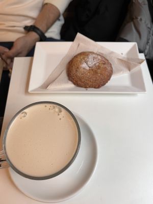 Chai latte and lemon chia cookie  at The Village Coffee & Music in Utrecht
