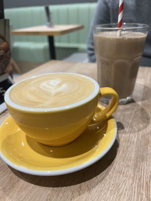 Oat latte and a chocolate peanut butter smoothie   at Eden Cafe Clifton in Bristol
