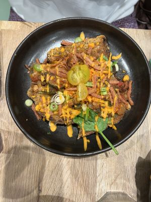 Some pics from our second visit! Smokey beans on toast with vegan cheese and fake bacon - yum!  at Eden Cafe Clifton in Bristol