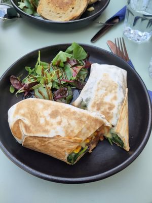 The outside with a small salad on the side. at Eden Cafe Clifton in Bristol