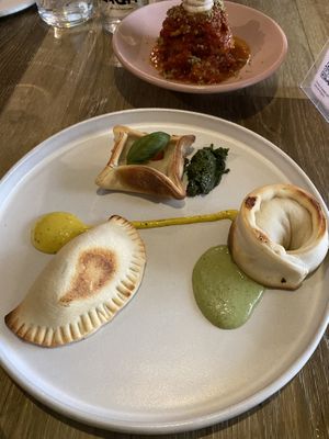 Empanadas, Eggplant Parmesan  at Mudra in Buenos Aires