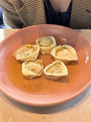 Inedible ravioli swimming in flavorless oil   at Mudra in Buenos Aires