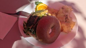 Tofu and pesto bagel sandwich can be requested vegan at Bruchelle's in Covington