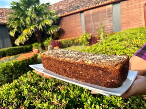 Pan a base de almendra, chia,leche de coco, banano y pasas. at Gaia Forest Cafe & Market in Granada