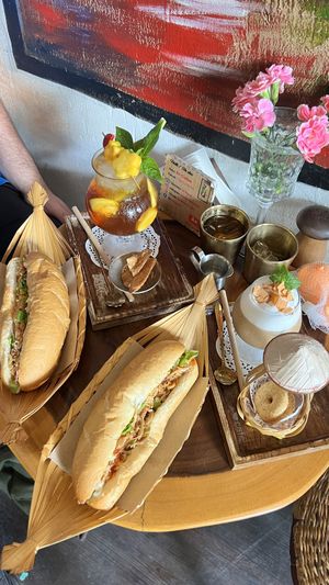 Vegetarian banh mi, mango iced tea + iced coconut coffee.  at An Bread & Cafe in Hanoi