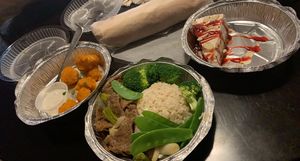 Mongolian Delight, cauliflower wings, cheesecake, and BBQ baguette  at Loving Hut - Cape Coral in Cape Coral