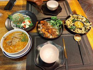 tomyum noodles, satay mushroom, fried morning glory, pandan rice at Wai Thai in Hanoi