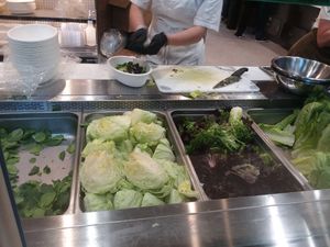 Leafy greens to choose from at salad bar cafe at Seed to Table Market in Naples