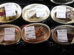 Raw vegan desserts in refrigerated case to the right of raw vegan counter/cafe (differs each day) at Seed to Table Market in Naples