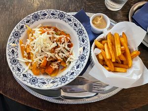 Weekend vegan meal on the lunch menu. Veggies with tofu and vegan cheese, fries with a side of hummus instead of mayo.   at Bullerbyn in Prague
