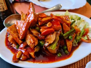 79. Kung Pao Tofu. Diced tofu fried with snow peas, bell pepper, peanuts & red chilli in our authentic Szechwan-Kung Pao sauce. at Asian Aroma in Tallinn
