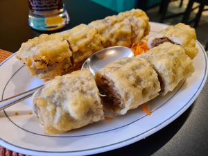 3. Vegetable Spring Rolls. Well-cooked vegetable filling rolled in a pancake and fried crisp; served with spicy or Sweet & Sour sauce. at Asian Aroma in Tallinn