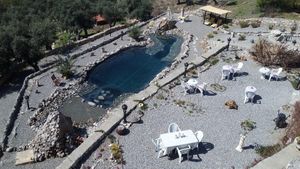 The Chardonnay Terrace, where dinner is served.  The Rose Pool, a 28m eco pool. at Palace Gökbel in Dalyan