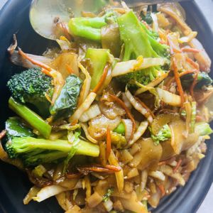 Wide rice noodles with vegetables.  at Cravings in Geneva