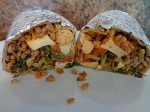 Harvest w/ tofu. Farro, sweet potato, almond slivers, arugula, pumpkin seeds, golden raisins, house vinaigrette. Discontinued in 2025, sadly. at CLE - Currito - Main Terminal in Cleveland