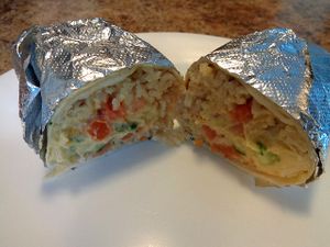 Mediterranean, minus the feta to make it vegan. Brown rice, pico de gallo, house vinaigrette, house made hummus, cucumber. at CLE - Currito - Main Terminal in Cleveland