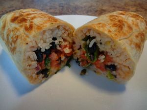 Build-You-Own Wrap. Cilantro lime rice, black beans, kale, romaine lettuce, roasted tomato salsa, pico de gallo, house vinaigrette, hot sauce, pumpkin seeds. For those who like spicy and tangy. at CLE - Currito - Main Terminal in Cleveland