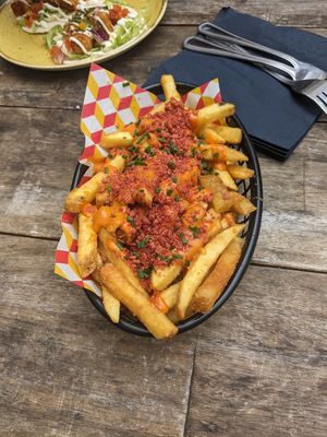 Dirty vegan fries with cheese and bacon bits at Chance & Counters in Birmingham
