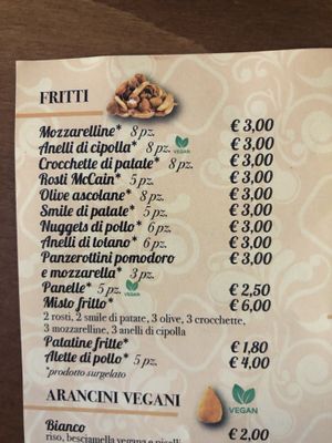 Vegan: Onion rings, panelle (chickpea fried burger)  at Mr. Arancino in Catania