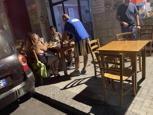 Outside seating in nice weather   at Mr. Arancino in Catania