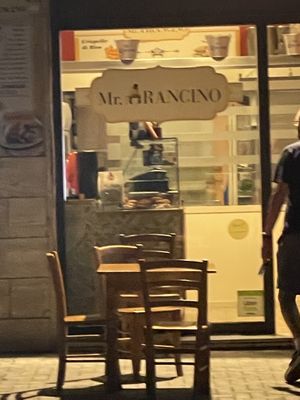 Outside the shop   at Mr. Arancino in Catania