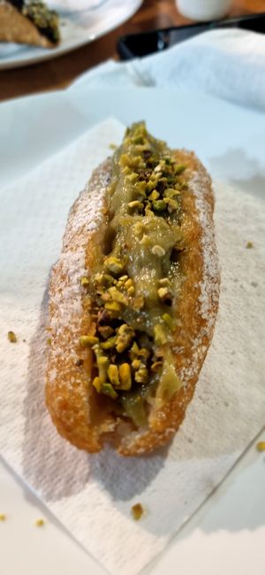 Sfincione with pistachio custard at Mr. Arancino in Catania