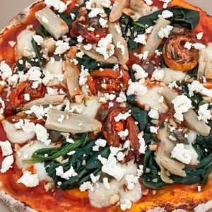 Vegan feta pizza and spinach  at Locco's Pizza Bar in Koh Phangan