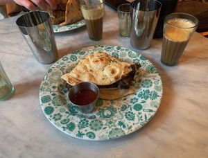 Vegan sausage naan  at Dishoom in Manchester