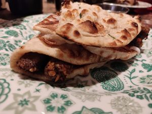 Vegan sausages naan roll at Dishoom in Manchester