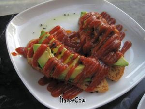 Bruschetta: Avocado, olive oil and cilantro with chili jam and black salt, but without the cilantro at Encuentro in Oakland