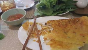 Banh Xeo (Vietnamese pancake filled with mushroom, served with greens for wrapping) at San May - Q10 in Ho Chi Minh City