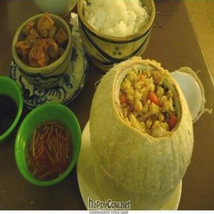 fried rice in coconut bowl and tofu with button mushrooms at Ngoc Tho in Ho Chi Minh City