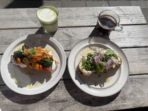 Avocado kimchi toast & matcha latte // smashed peas toast & americano  at Farm2Table - Davidshall in Malmo