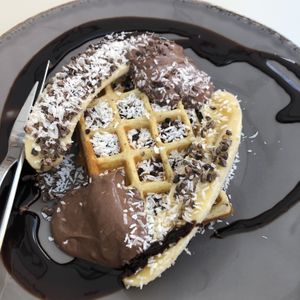 Waffle with banana and chocolate  at Farm2Table - Davidshall in Malmo