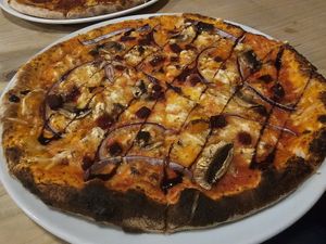 Pizza with beetroot, roast squash, vegan cheese, mushies, and red onion. #Veganuary at Black Isle  in Fort William