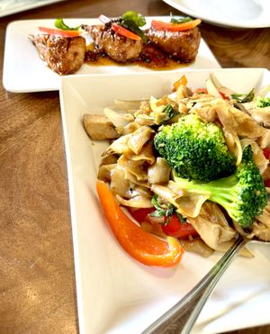 Drinking noodle and chixn wings  at Love Organic Cafe in West Hollywood