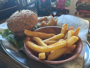 Beyond Burger with fries and beer battered onion rings (R 149.00) at Bossa Good Times Bar in Paarl