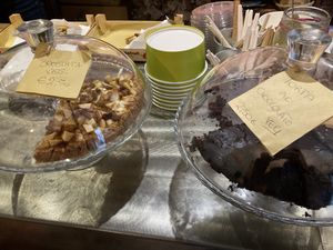 Some of the desserts served today: a pie with jam apples and nuts and a chocolate cake   at La Reverie in Parma