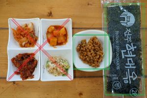 Free side dishes which you can refill yourself. Vegans can enjoy the sweet small beans and the roasted seaweed. You can also get unlimited rice and soybean sprouts with your meal! at Hyundaiok in Jeonju