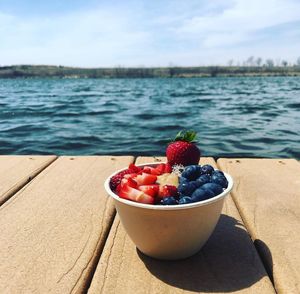 Delicious acai bowl topped with strawberries, blueberries and house made peanut butter  at Bowls of Love - Food Truck in Cedar Falls