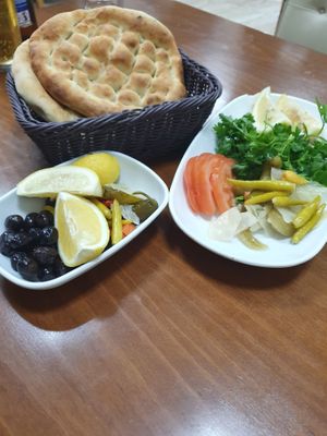 vegan bread and salads that come free with soup order  at Heybe Çorba in Kyrenia