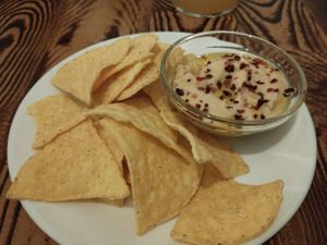 Lovely hummus with nachos. at Kerkus Veggie Bar in Montecorto