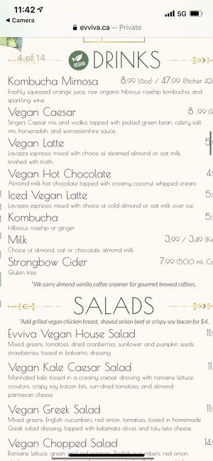 Drinks and salads at Evviva in Toronto