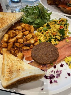 Omg. The scrambled tofu so buttery and savory. Must try! at Evviva in Toronto