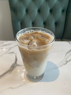 iced maple latte with oat milk  at Evviva in Toronto