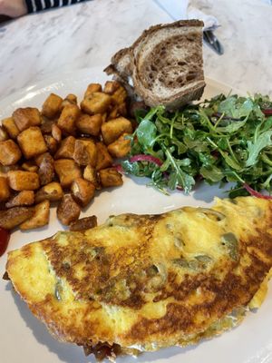 Vegan green omelette   at Evviva in Toronto