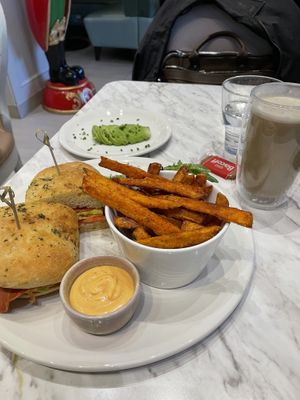 Just egg soy bacon tomato avo sandwich with sweet tater fries and oat espresso!  at Evviva in Toronto