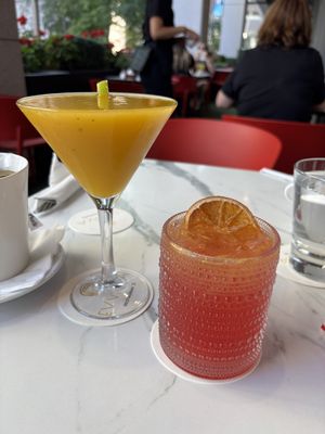 Mango margarita and tequila sunrise. Yum!   at Evviva in Toronto