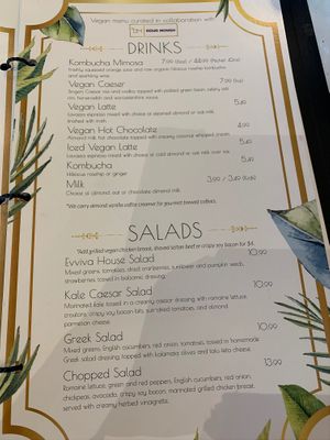 Drinks and salads at Evviva in Toronto